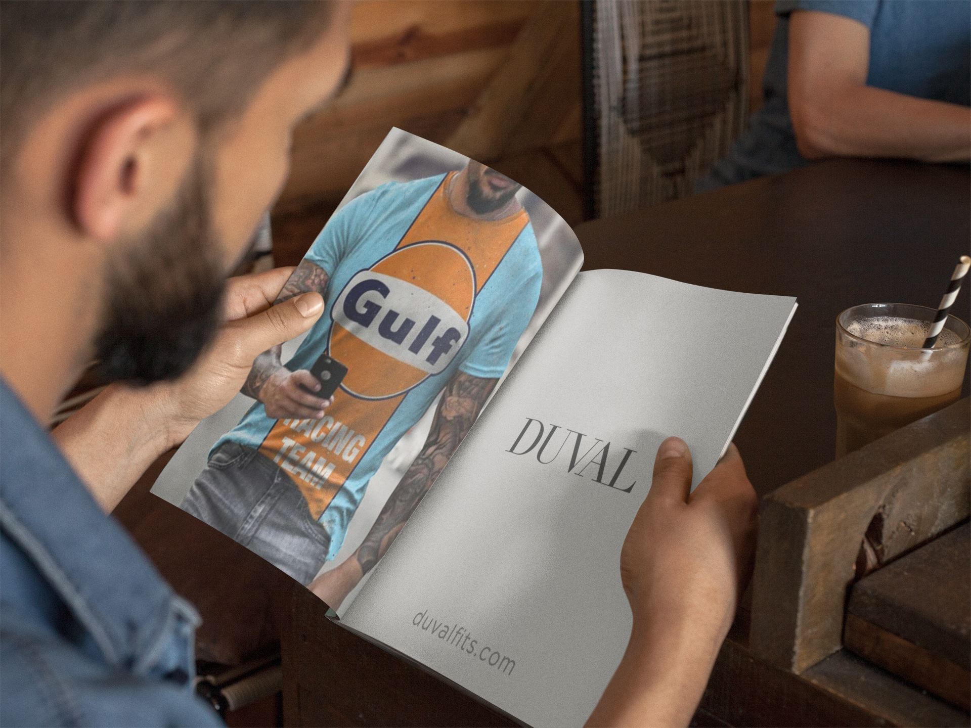 latino-model-at-a-coffee-shop-reading-a-magazine-template-a14447 (1)