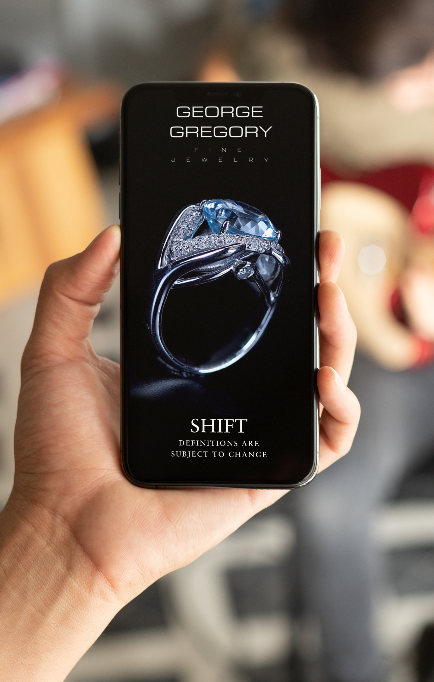 mockup-of-an-iphone-xs-with-a-guy-playing-guitar-in-the-back-25752 (1)